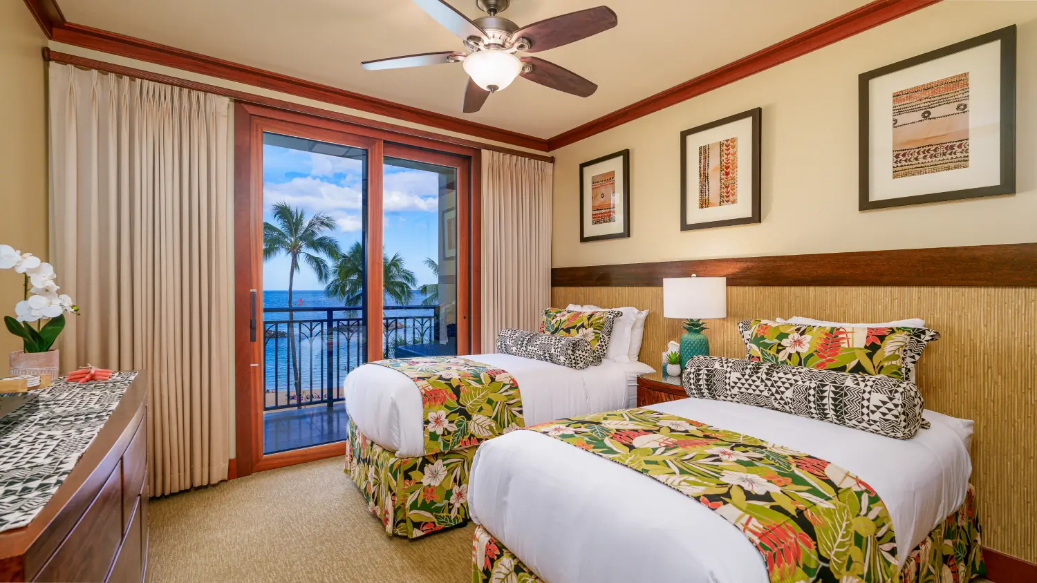 BVKO BT-309 Aug 2024 (16 of 69) Guest room in Beach Tower 309 with twin beds and tropical decor.